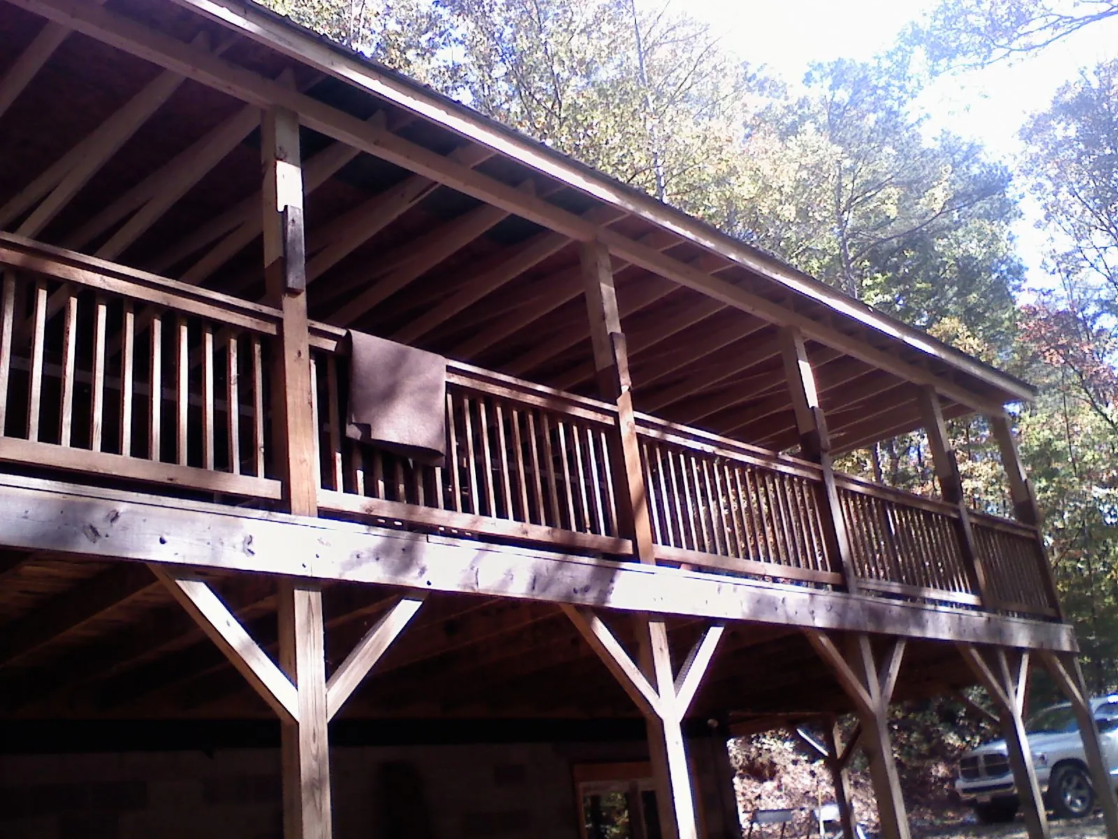 Timber framing under a new elevated porch and deck — Roof Leak Repair in Leetonia by Roofing Brothers